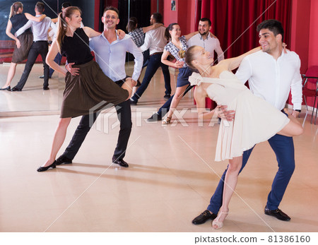 Couples enjoying latin dances 81386160