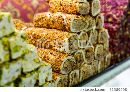 Turkish lokum with nougat, fruits and pistachios for sale 81389908