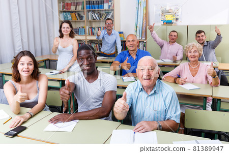 Students different ages satisfied results exam 81389947