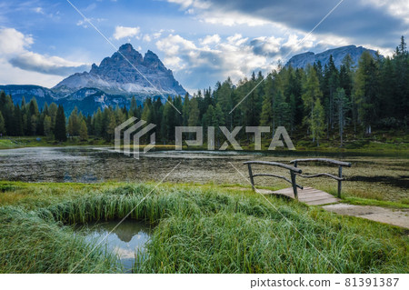 Aerial view of Lago Antorno Lake,Tre Cime di Lavaredo mountain in background, Dolomites, Italy Aerial view of Lago Antorno Lake,Tre Cime di Lavaredo mountain in background, Dolomites, Italy 81391387