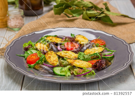 Fresh vegetable salad, healthy food, organic cucumbers, mussels, tomatoes and salad leaves Fresh vegetable salad, healthy food, organic cucumbers, mussels, tomatoes and salad leaves 81392557