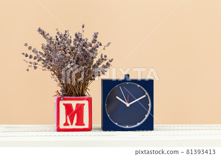 Alarm clock on wooden table close up Alarm clock on wooden table close up 81393413