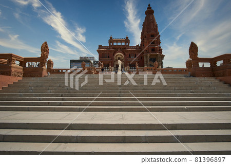 Baron Empain Palace in Cairo, Egypt  (Le Palais Hindou) exterior daylight shot showing the unique architecture of the palace with visitors walking 81396897