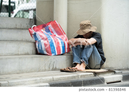 Street life tired homeless sitting 81398846