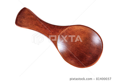 Tiny wooden spoon isolated on white background, overhead photo. Tiny wooden spoon isolated on white background, overhead photo. 81400037