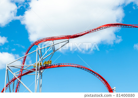 Roller Coaster in amusement park on blue sky background 81400880