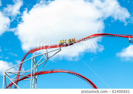 Roller Coaster in amusement park on blue sky background 81400881