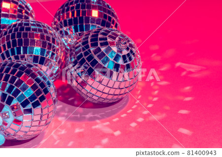 Mirror disco balls over pink background. Party, nightlife concept Mirror disco balls over pink background. Party, nightlife concept 81400943