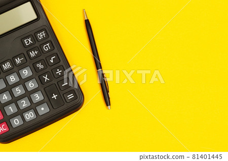 calculator with pen for accountant on yellow background 81401445