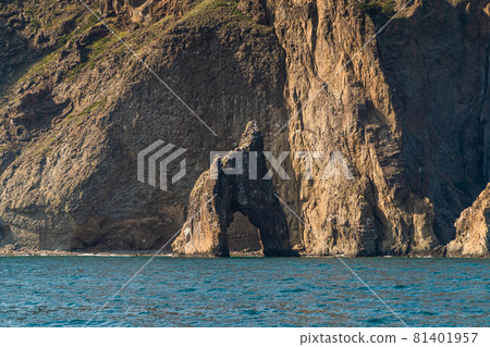 The Republic of Crimea. July 21, 2021. A picturesque view in sunny weather of the Golden Gate rock at the foot of the Kara-Dag mountain near the city of Koktebel. 81401957