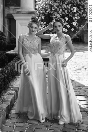 European girls bridesmaids in pink dresses having fun European girls bridesmaids in pink dresses having fun 81402061