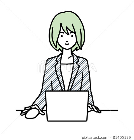 A woman in a suit sitting at a desk and using a PC A woman in a suit sitting at a desk and using a PC 81405159