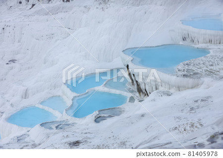 Natural travertine pools and terraces in Pamukkale. Cotton castle in southwestern Turkey.  81405978