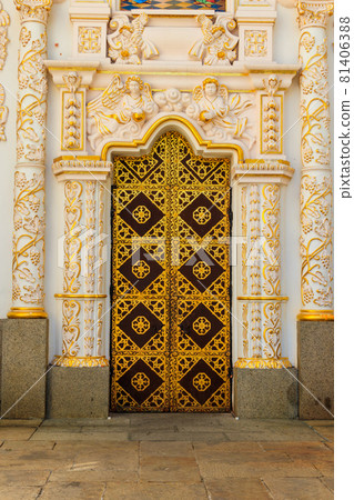 Ornamented gilded door of the Dormition cathedral of Kiev Pechersk Lavra (Kiev Monastery of the Caves) in Ukraine Ornamented gilded door of the Dormition cathedral of Kiev Pechersk Lavra (Kiev Monastery of the Caves) in Ukraine 81406388
