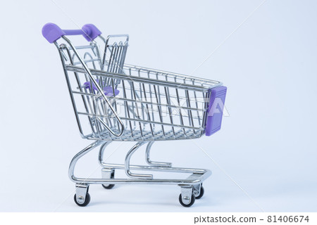 Shopping basket on wheels. Shopping, sales concept. Empty shopping cart Shopping basket on wheels. Shopping, sales concept. Empty shopping cart 81406674