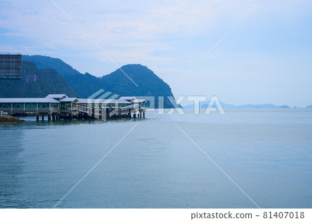 Covered boat pier. Transport boat port on a tropical island 81407018