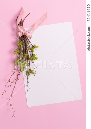 Mock up. Small spring bouquet with a white blank paper. Mock up. Small spring bouquet with a white blank paper. 81411410