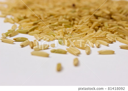 Brown rice isolated on the white background 81418092