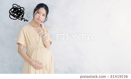 Pregnant woman with a troubled face 81419536