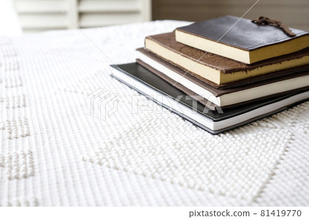 Stacked books and notebooks Stacked books and notebooks 81419770