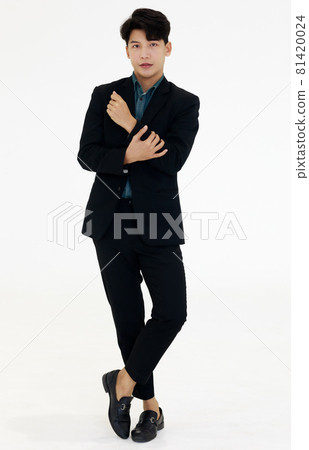 Full body photo portrait of young and handsome Asian businessman on wearing shirt and jacket casual dress on white background. Full body photo portrait of young and handsome Asian businessman on wearing shirt and jacket casual dress on white background. 81420024