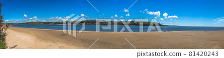 Panoramic shot of LLansteffan beach with clear blue water in southern Wales Panoramic shot of LLansteffan beach with clear blue water in southern Wales 81420243