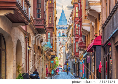 Narrow turkish street by the Galata Tower of Istanbul 81421324