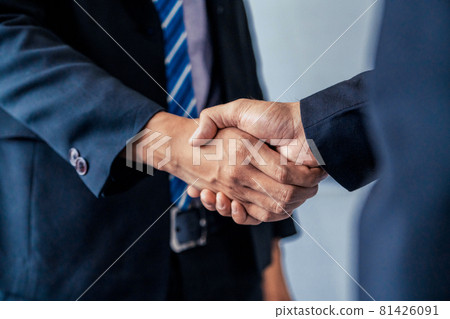 Business people handshake agreement in office. Business people handshake agreement in office. 81426091