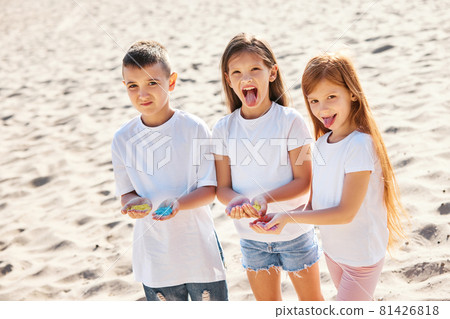 child girls and boy celebrate Indian holi festival 81426818