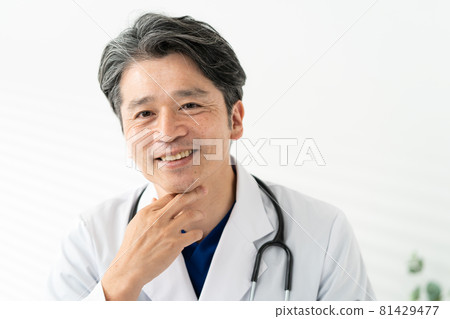 Doctor middle man white coat scrub medical examination 81429477