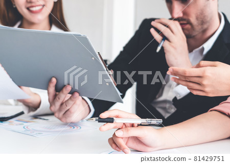 Businessman and businesswomen working in office. Businessman and businesswomen working in office. 81429751