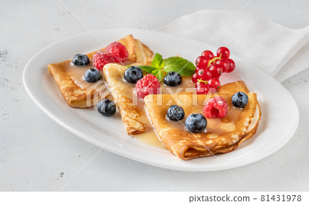 Crepes with fresh berries 81431978