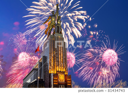 Celebratory colorful fireworks and soviet monument Rabochiy i Kolkhoznitsa ( Worker and Kolkhoz Woman or Worker and Collective Farmer) of sculptor Vera Mukhina, Moscow, Russia. Made of in 1937 81434743