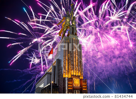 Celebratory colorful fireworks and soviet monument Rabochiy i Kolkhoznitsa ( Worker and Kolkhoz Woman or Worker and Collective Farmer) of sculptor Vera Mukhina, Moscow, Russia. Made of in 1937 Celebratory colorful fireworks and soviet monument Rabochiy i Kolkhoznitsa ( Worker and Kolkhoz Woman or Worker and Collective Farmer) of sculptor Vera Mukhina, Moscow, Russia. Made of in 1937 81434744