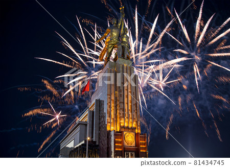 Celebratory colorful fireworks and soviet monument Rabochiy i Kolkhoznitsa ( Worker and Kolkhoz Woman or Worker and Collective Farmer) of sculptor Vera Mukhina, Moscow, Russia. Made of in 1937 81434745