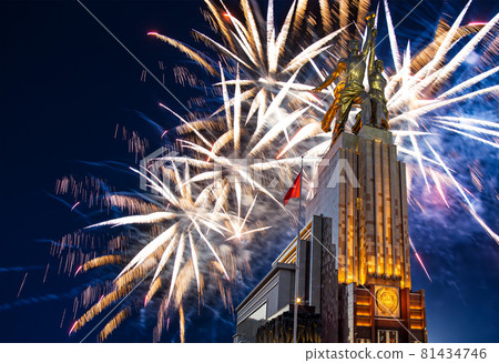 Celebratory colorful fireworks and soviet monument Rabochiy i Kolkhoznitsa ( Worker and Kolkhoz Woman or Worker and Collective Farmer) of sculptor Vera Mukhina, Moscow, Russia. Made of in 1937 Celebratory colorful fireworks and soviet monument Rabochiy i Kolkhoznitsa ( Worker and Kolkhoz Woman or Worker and Collective Farmer) of sculptor Vera Mukhina, Moscow, Russia. Made of in 1937 81434746