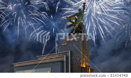 Celebratory colorful fireworks and soviet monument Rabochiy i Kolkhoznitsa ( Worker and Kolkhoz Woman or Worker and Collective Farmer) of sculptor Vera Mukhina, Moscow, Russia. Made of in 1937 Celebratory colorful fireworks and soviet monument Rabochiy i Kolkhoznitsa ( Worker and Kolkhoz Woman or Worker and Collective Farmer) of sculptor Vera Mukhina, Moscow, Russia. Made of in 1937 81434748