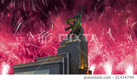 Celebratory colorful fireworks and soviet monument Rabochiy i Kolkhoznitsa ( Worker and Kolkhoz Woman or Worker and Collective Farmer) of sculptor Vera Mukhina, Moscow, Russia. Made of in 1937 Celebratory colorful fireworks and soviet monument Rabochiy i Kolkhoznitsa ( Worker and Kolkhoz Woman or Worker and Collective Farmer) of sculptor Vera Mukhina, Moscow, Russia. Made of in 1937 81434749