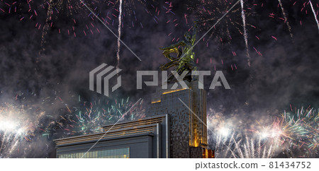 Celebratory colorful fireworks and soviet monument Rabochiy i Kolkhoznitsa ( Worker and Kolkhoz Woman or Worker and Collective Farmer) of sculptor Vera Mukhina, Moscow, Russia. Made of in 1937 Celebratory colorful fireworks and soviet monument Rabochiy i Kolkhoznitsa ( Worker and Kolkhoz Woman or Worker and Collective Farmer) of sculptor Vera Mukhina, Moscow, Russia. Made of in 1937 81434752