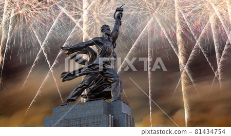 Celebratory colorful fireworks and soviet monument Rabochiy i Kolkhoznitsa ( Worker and Kolkhoz Woman or Worker and Collective Farmer) of sculptor Vera Mukhina, Moscow, Russia. Made of in 1937 Celebratory colorful fireworks and soviet monument Rabochiy i Kolkhoznitsa ( Worker and Kolkhoz Woman or Worker and Collective Farmer) of sculptor Vera Mukhina, Moscow, Russia. Made of in 1937 81434754