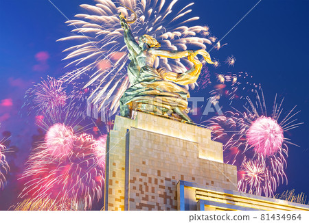 Celebratory colorful fireworks and soviet monument Rabochiy i Kolkhoznitsa ( Worker and Kolkhoz Woman or Worker and Collective Farmer) of sculptor Vera Mukhina, Moscow, Russia. Made of in 1937 81434964