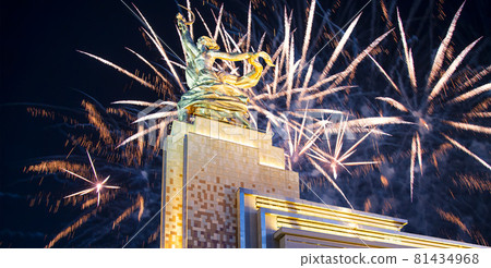 Celebratory colorful fireworks and soviet monument Rabochiy i Kolkhoznitsa ( Worker and Kolkhoz Woman or Worker and Collective Farmer) of sculptor Vera Mukhina, Moscow, Russia. Made of in 1937 Celebratory colorful fireworks and soviet monument Rabochiy i Kolkhoznitsa ( Worker and Kolkhoz Woman or Worker and Collective Farmer) of sculptor Vera Mukhina, Moscow, Russia. Made of in 1937 81434968
