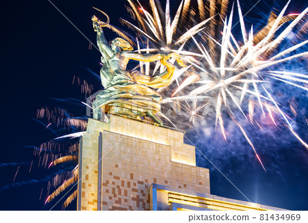 Celebratory colorful fireworks and soviet monument Rabochiy i Kolkhoznitsa ( Worker and Kolkhoz Woman or Worker and Collective Farmer) of sculptor Vera Mukhina, Moscow, Russia. Made of in 1937 Celebratory colorful fireworks and soviet monument Rabochiy i Kolkhoznitsa ( Worker and Kolkhoz Woman or Worker and Collective Farmer) of sculptor Vera Mukhina, Moscow, Russia. Made of in 1937 81434969