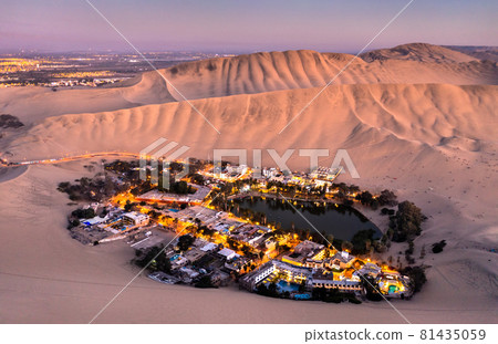 Aerial sunset view of the Huacachina Oasis in Peru Aerial sunset view of the Huacachina Oasis in Peru 81435059