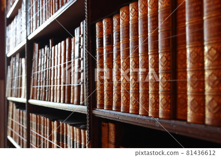 Old books in a bookcase 81436612