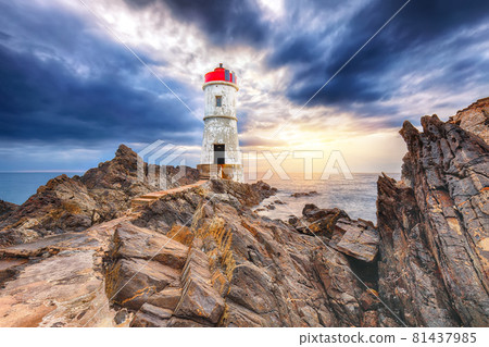 Gorgeous gloomy view of Capo Ferro Lighthouse. Gorgeous gloomy view of Capo Ferro Lighthouse. 81437985