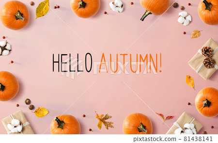 Hello autumn message with autumn pumpkins with present boxes Hello autumn message with autumn pumpkins with present boxes 81438141
