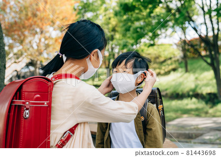 A girl who puts on a mask for a boy A girl who puts on a mask for a boy 81443698