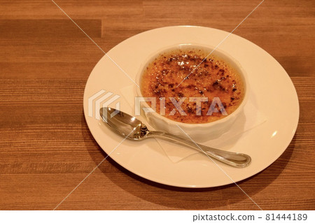 Creme brulee on a white plate Creme brulee on a white plate 81444189