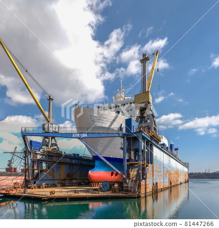 Large ship in dry dock of shipyard Large ship in dry dock of shipyard 81447266